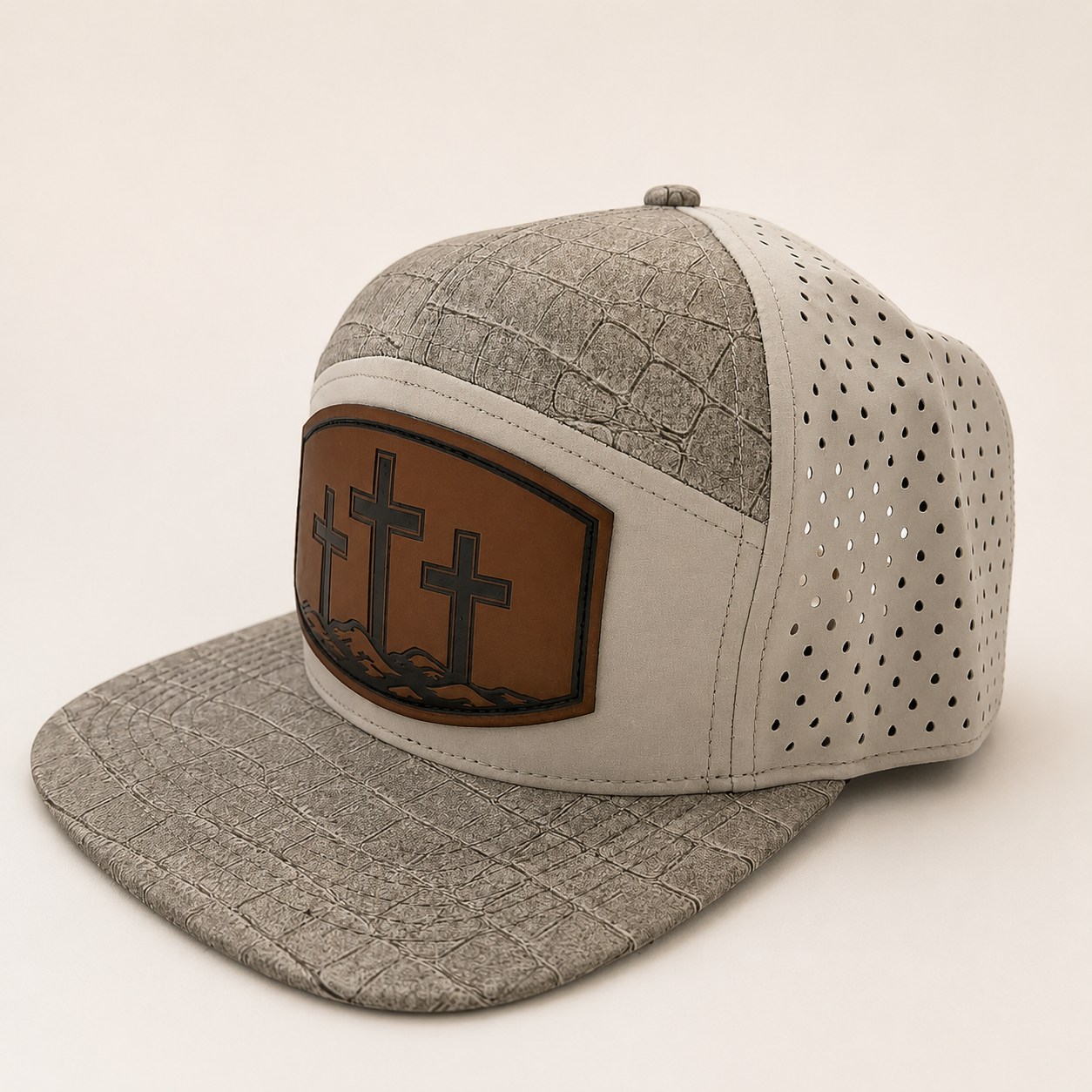 Gray alligator-pattern Three Cross hat, angled view showing the patch and perforated side panels